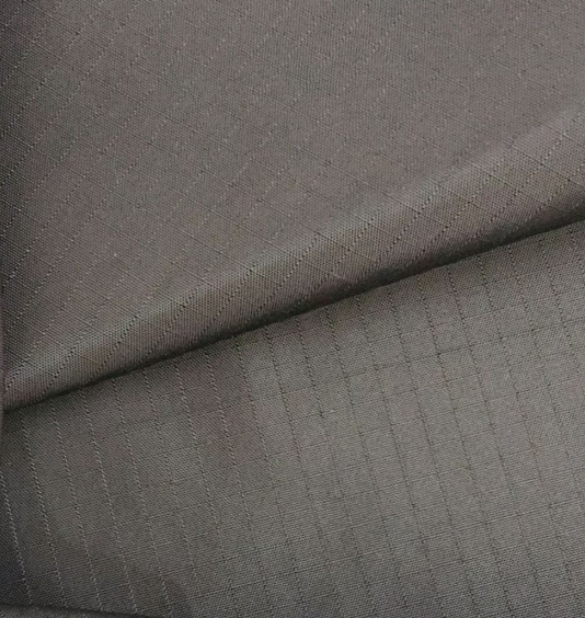 La surface douce a modelé le tissu de taffetas, tissu du polyester 300T par la cour